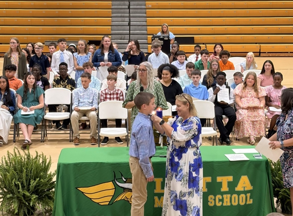 Students are inducted into the NJHS.