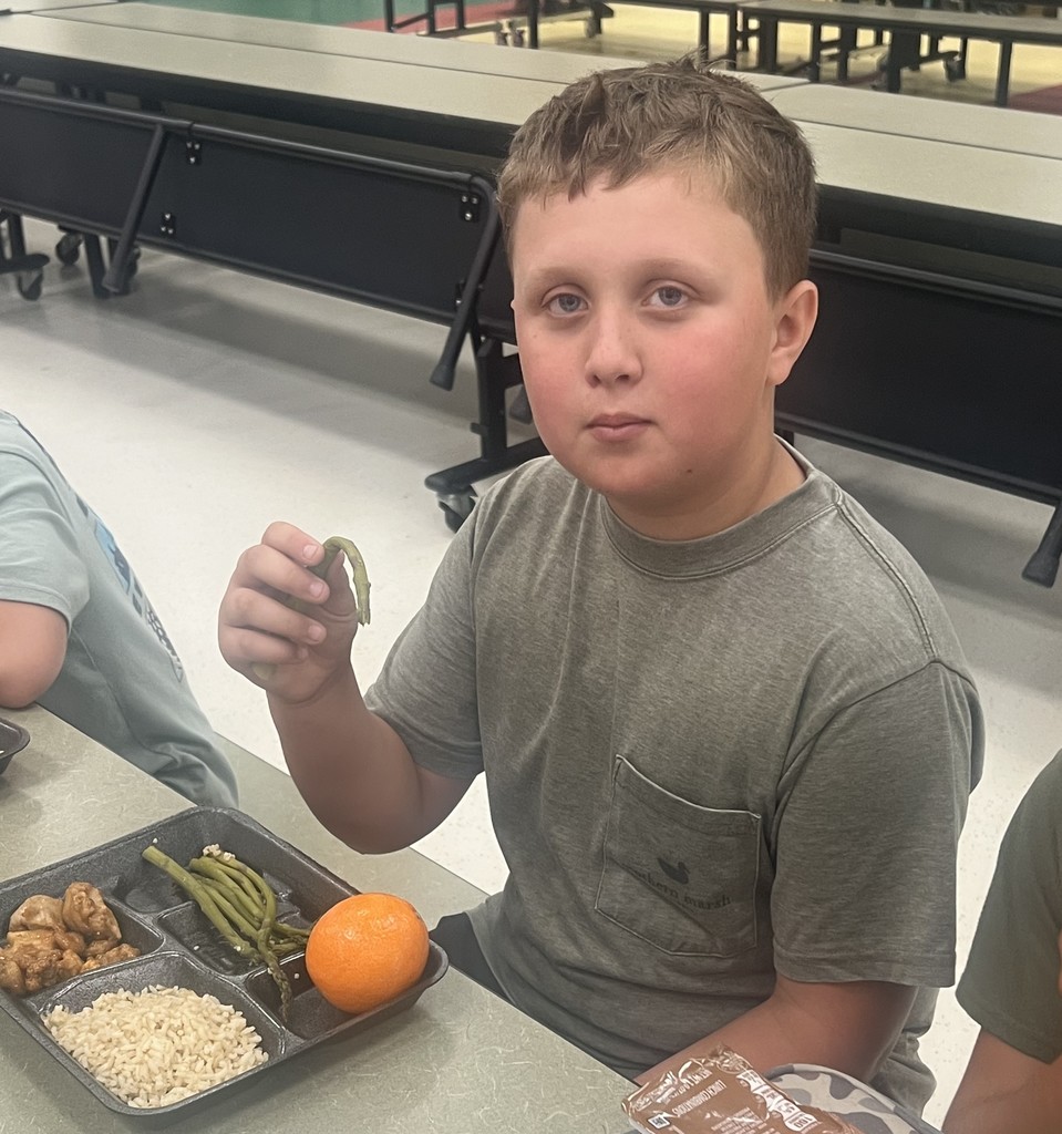 LES student trying asparagus