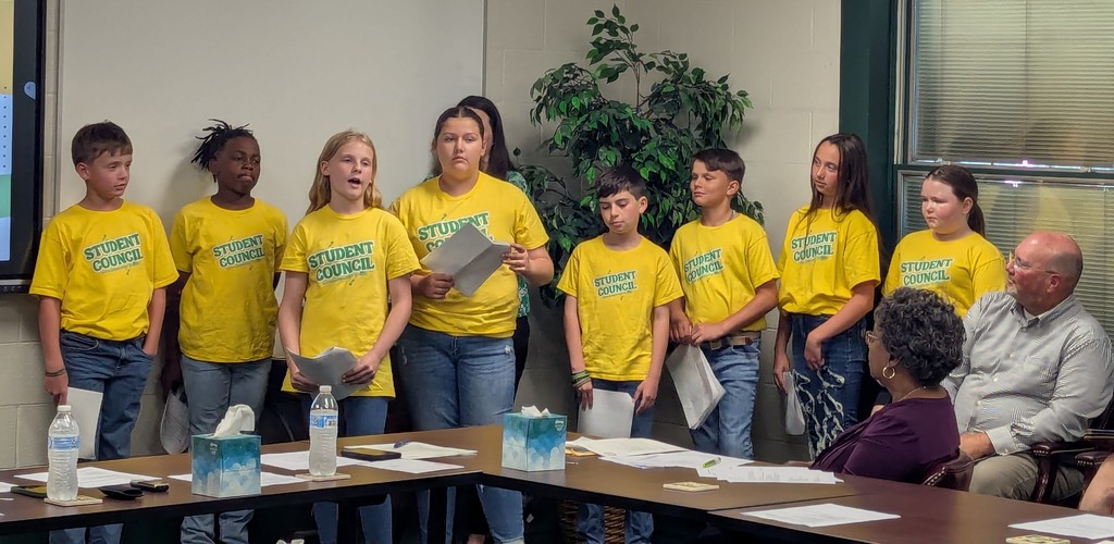 LES Student Council and Mrs. Luffman presenting on the election process for student council and sharing projects they have helped with and led throughout the school year.