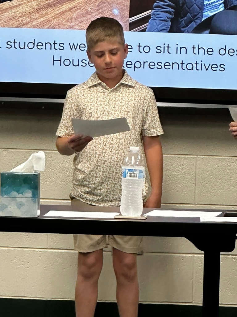 4th grade student presenting on the trip to the State House for Liberty Day