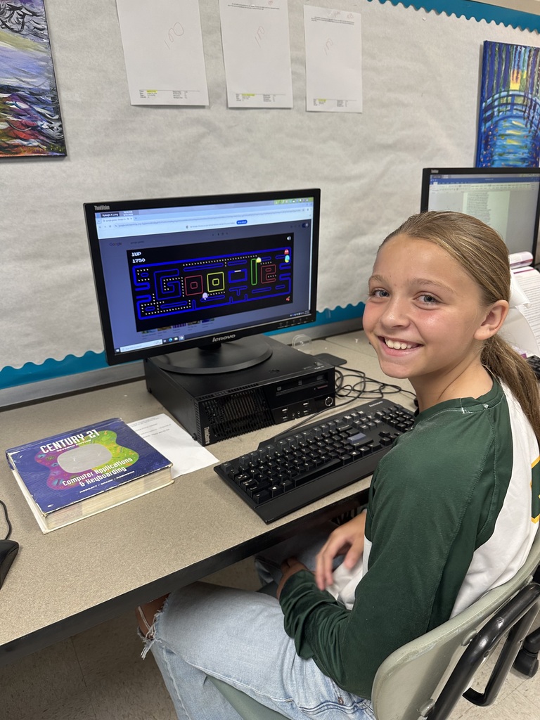 Student participating in Computer class.