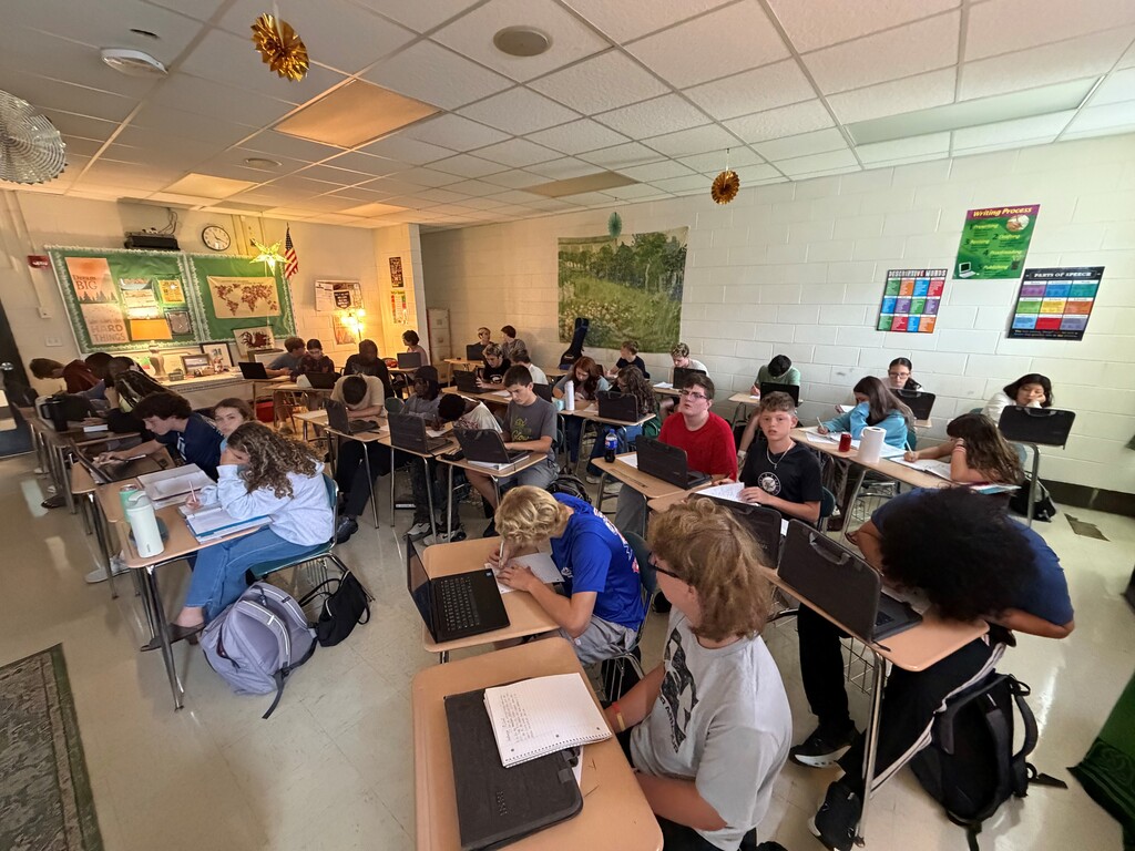 Students participating in a 9/11 remembrance activity during their Advanced Composition class.
