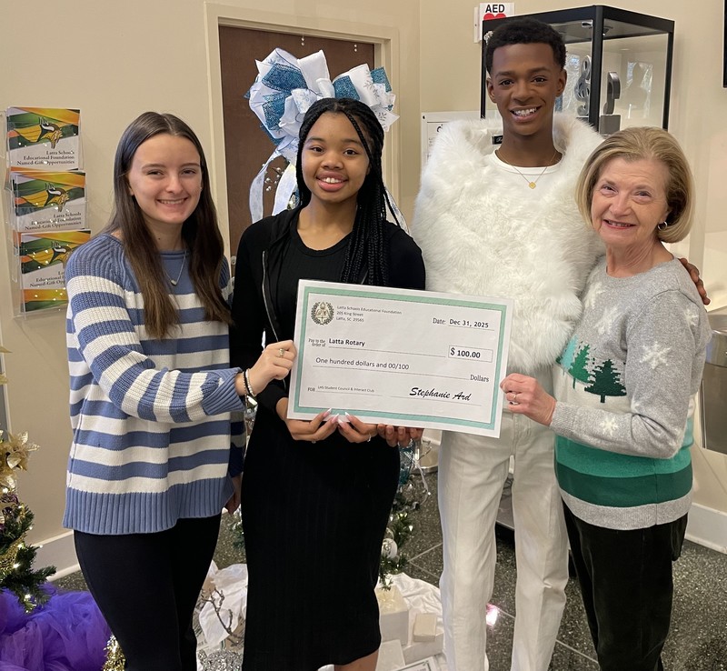 LHS Student Council/Interact Club presenting check to Latta Rotary