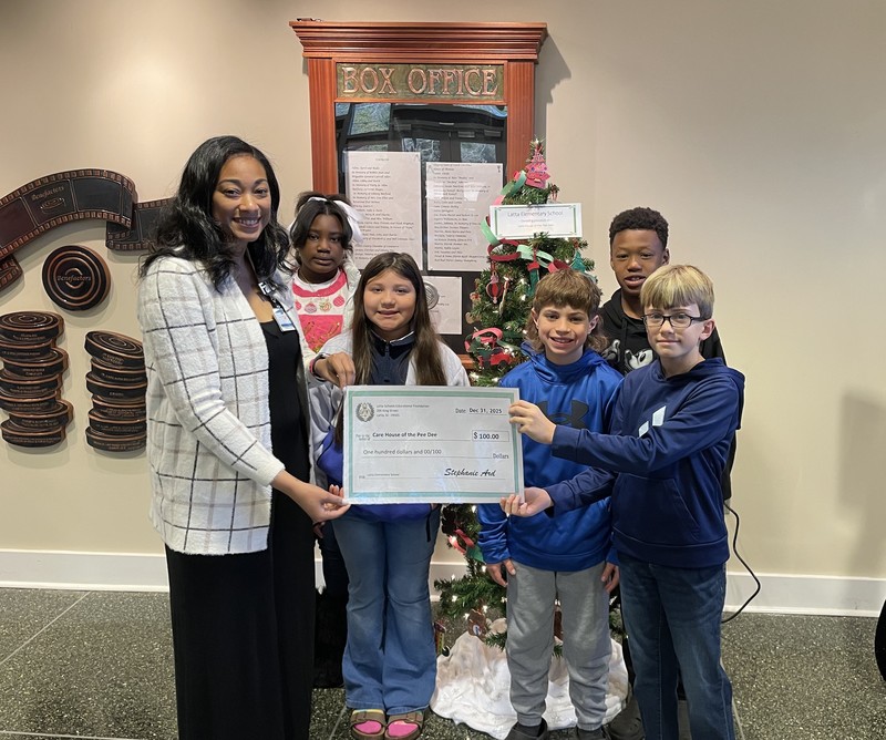 LES Students presenting donation to Care House of the Pee Dee
