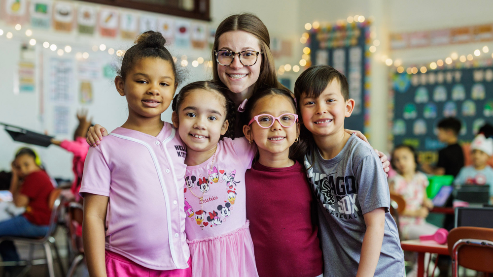 A teacher with students