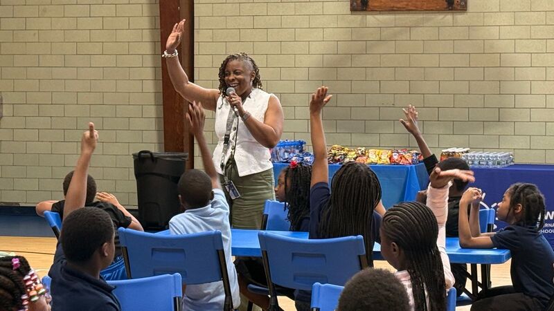 Principal Jean-Baptiste with rising 4th graders