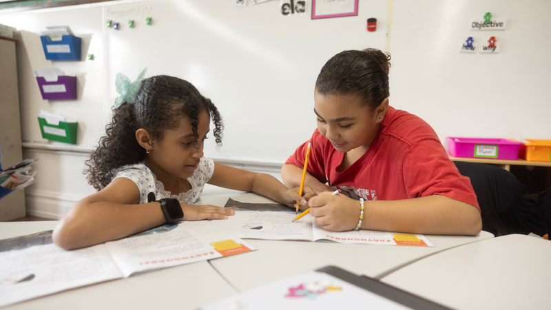 Students helping each other