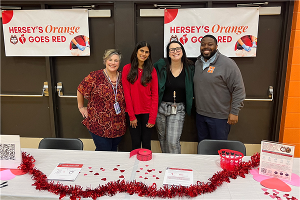 teachers and student smiling
