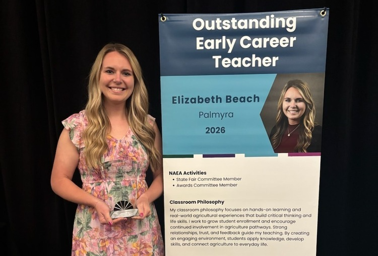Mrs. Beach receiving award