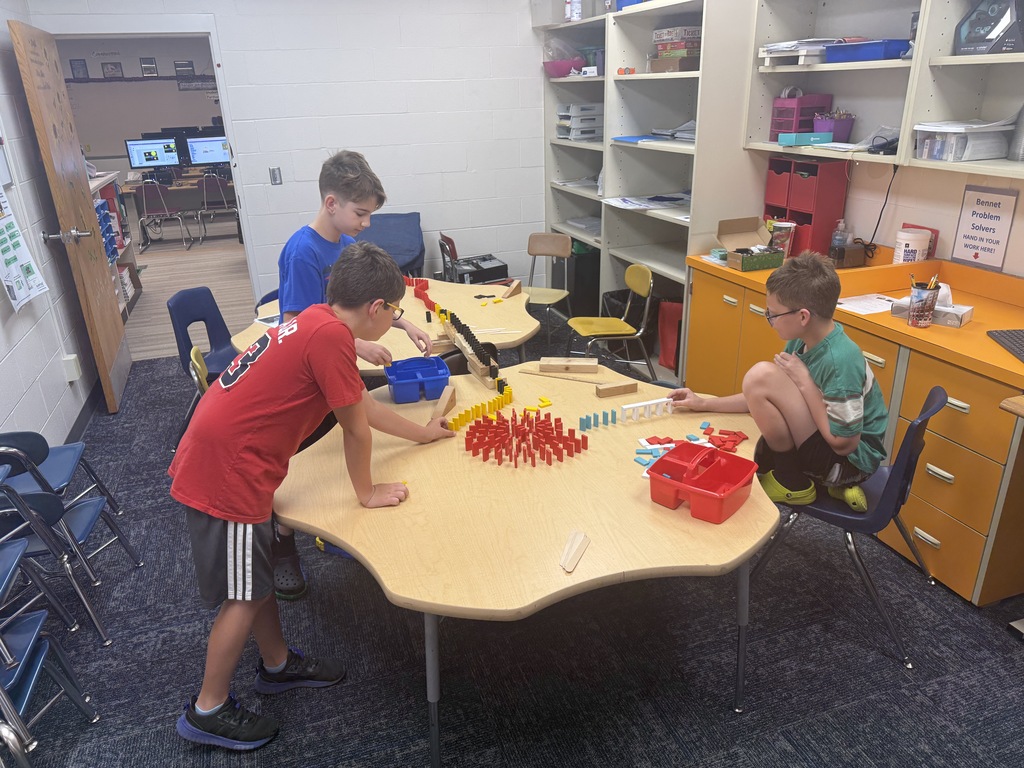 kids creating with dominos