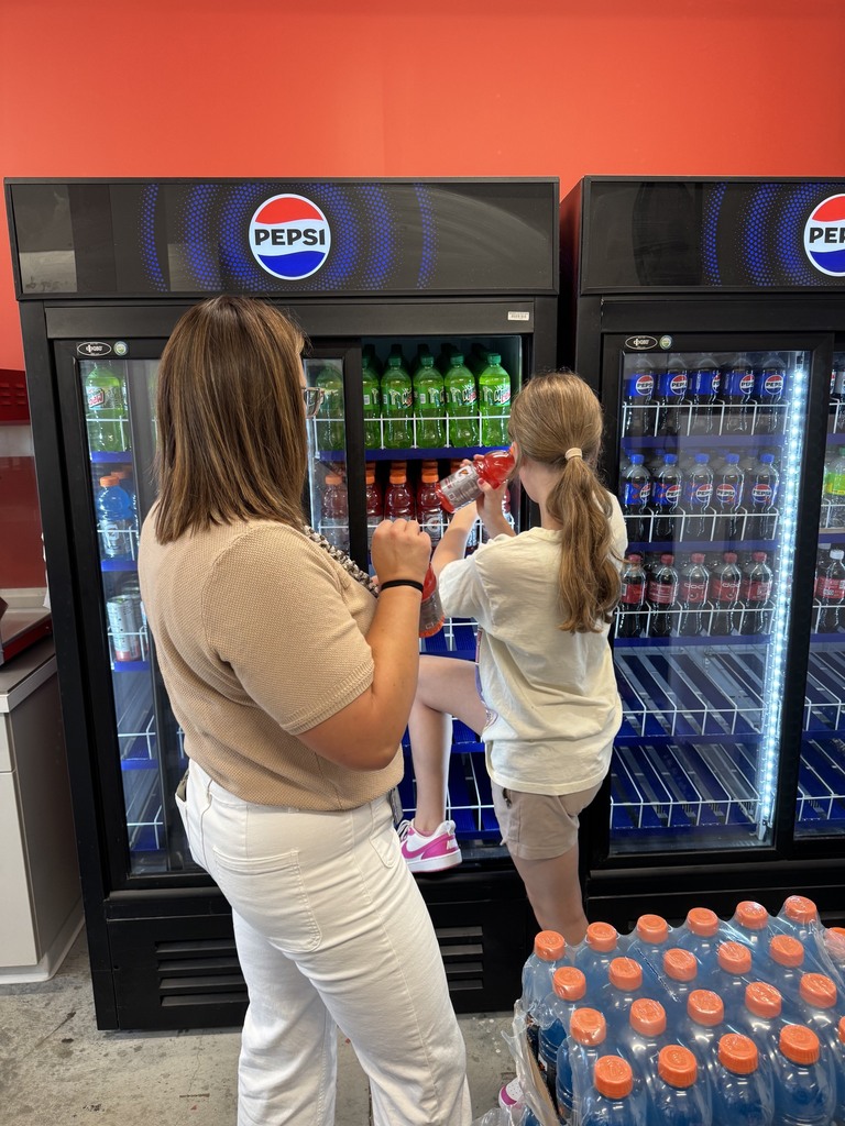 students stocking coolers