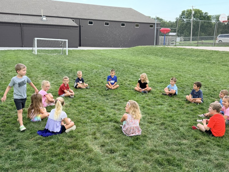 Kindergarteners Playing Duck, Duck, Goose!