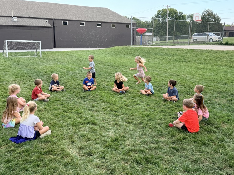 Kindergarteners Playing Duck, Duck, Goose!