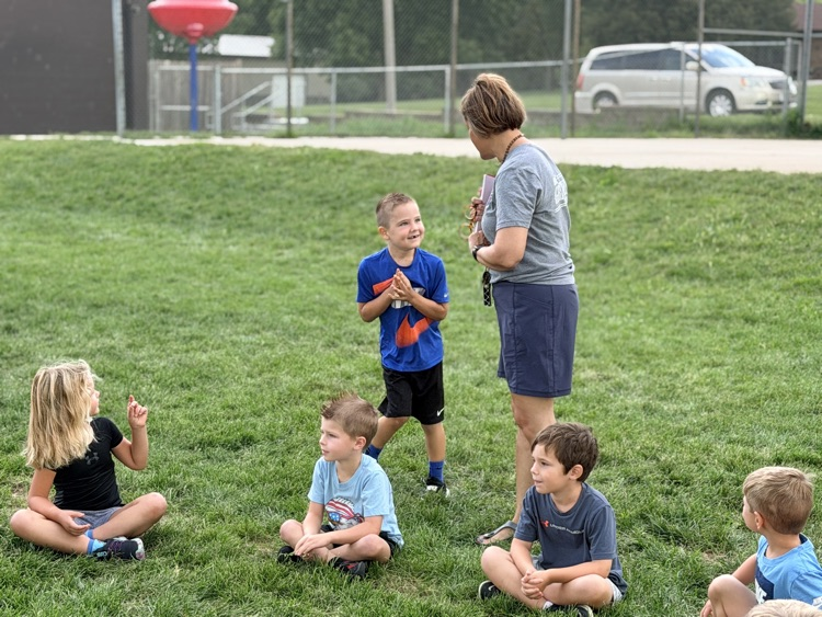 Kindergarteners Playing Duck, Duck, Goose!