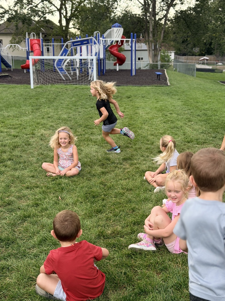 Kindergarteners Playing Duck, Duck, Goose!