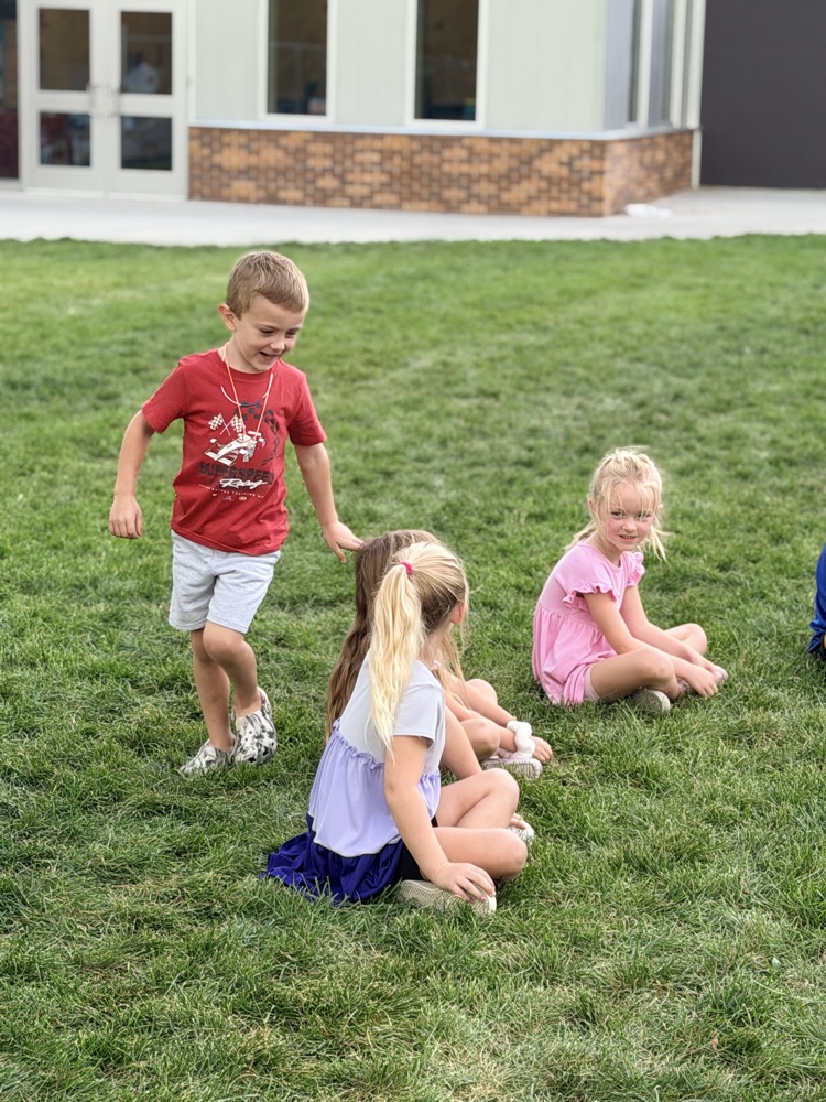 Kindergarteners Playing Duck, Duck, Goose!