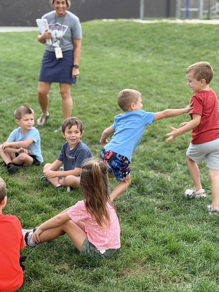 Kindergarteners Playing Duck, Duck, Goose!