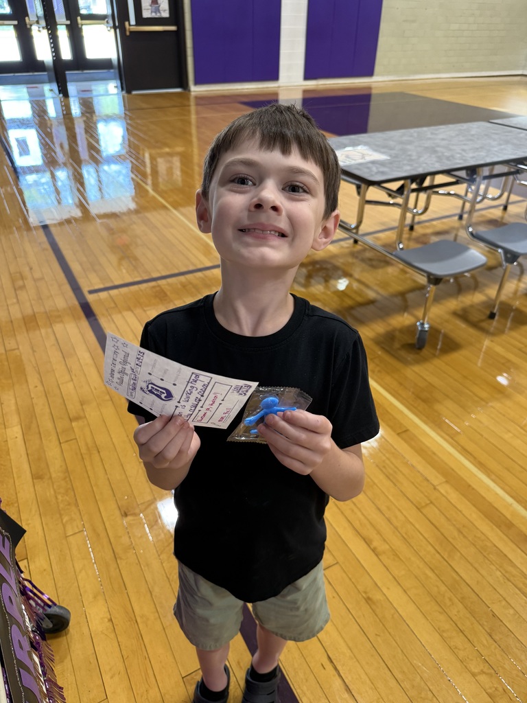 2nd grade boy with his positive office referral