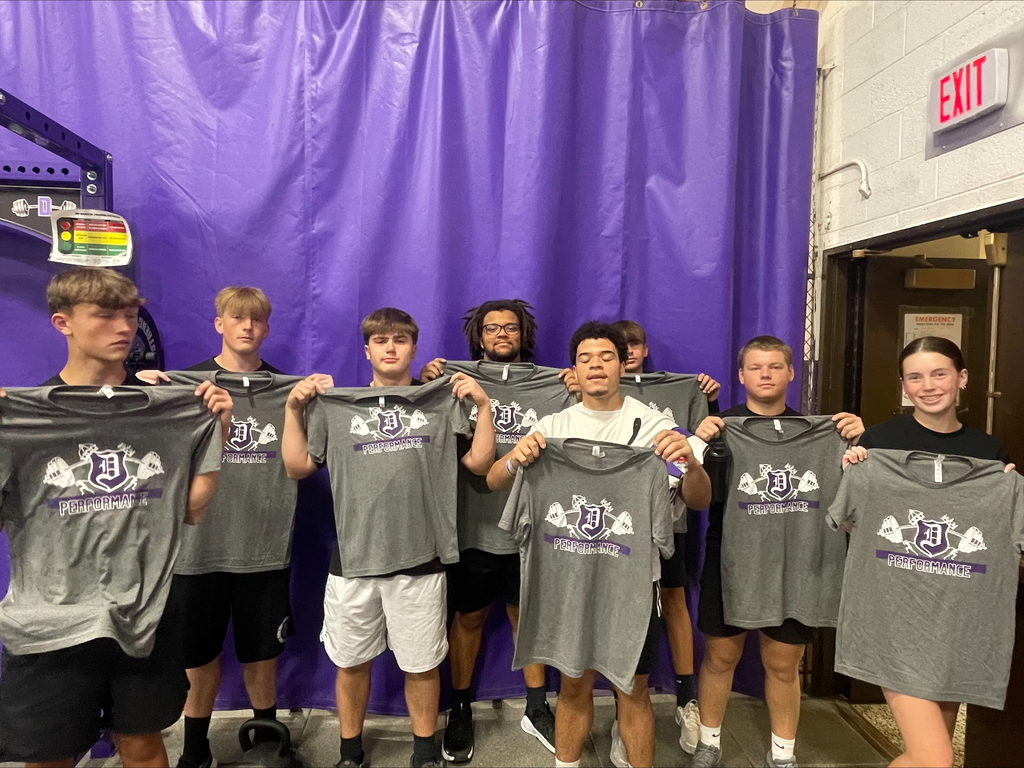 dixon performance athletes holding tshirts