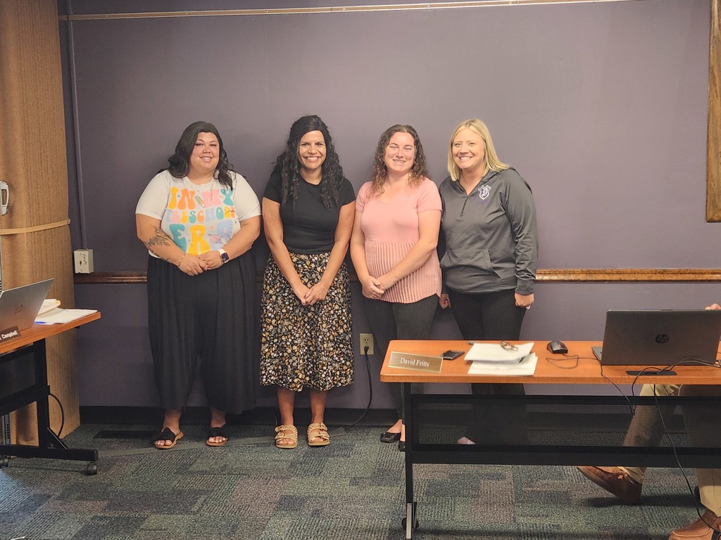 Photo of Principal Glenn and 3 of the Pre-K Staff