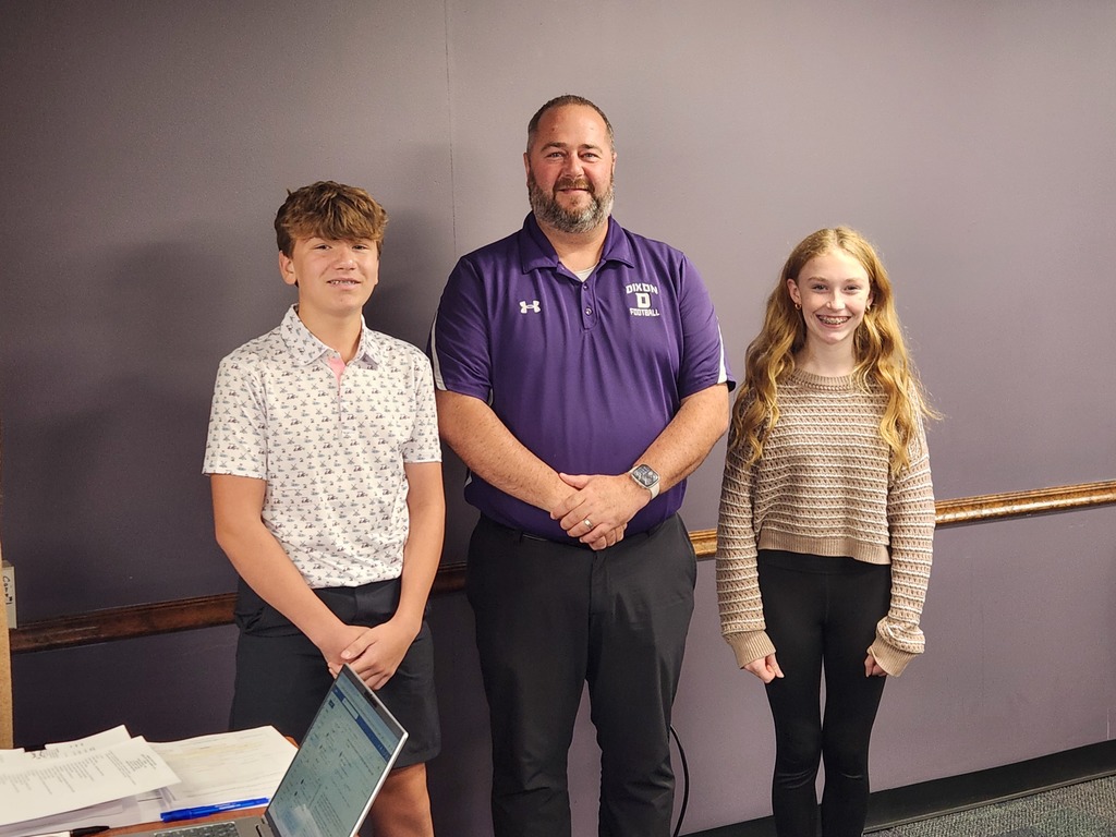 Principal Magnafici with Owen and Lauren, the RMS September students of the month