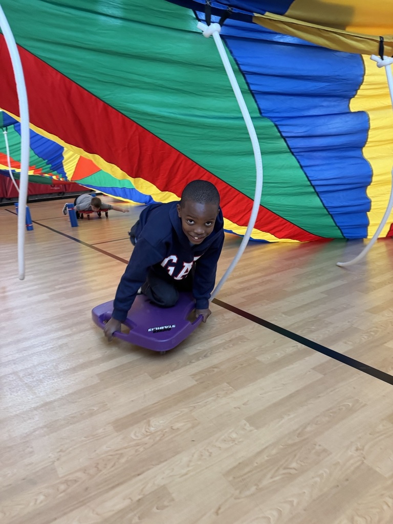 a third grader on her scooter  in the scooter fort 
