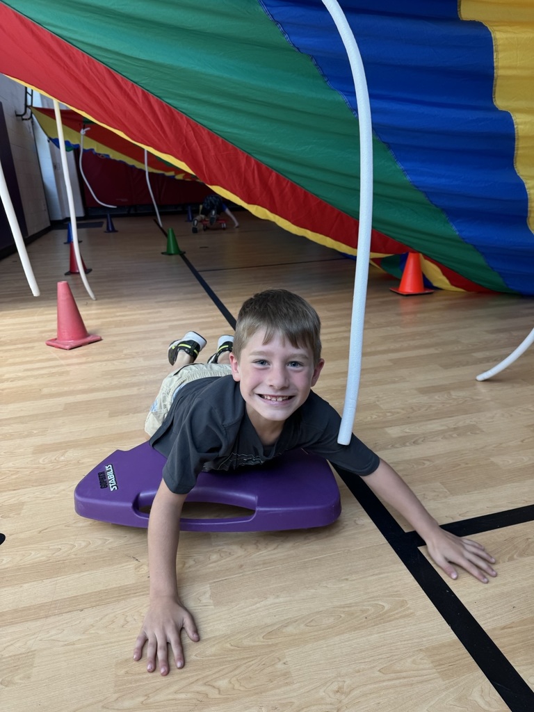 2nd grader on a scooter in the fort 
