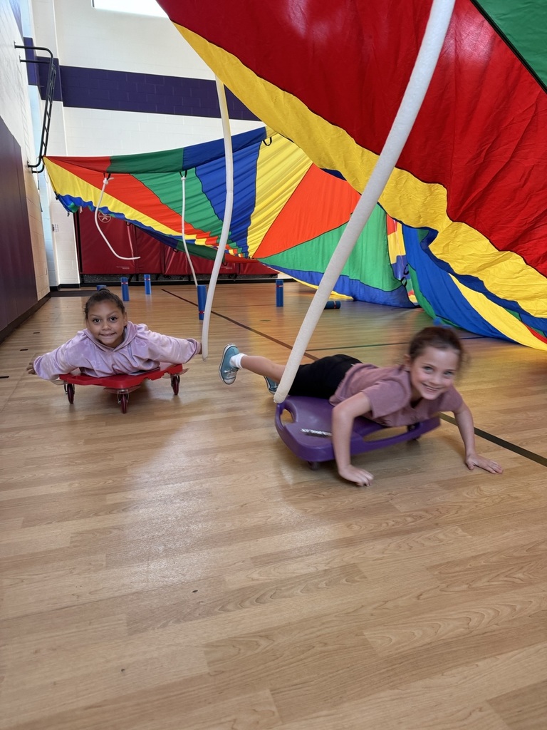 two third graders on scooters in the scooter fort 