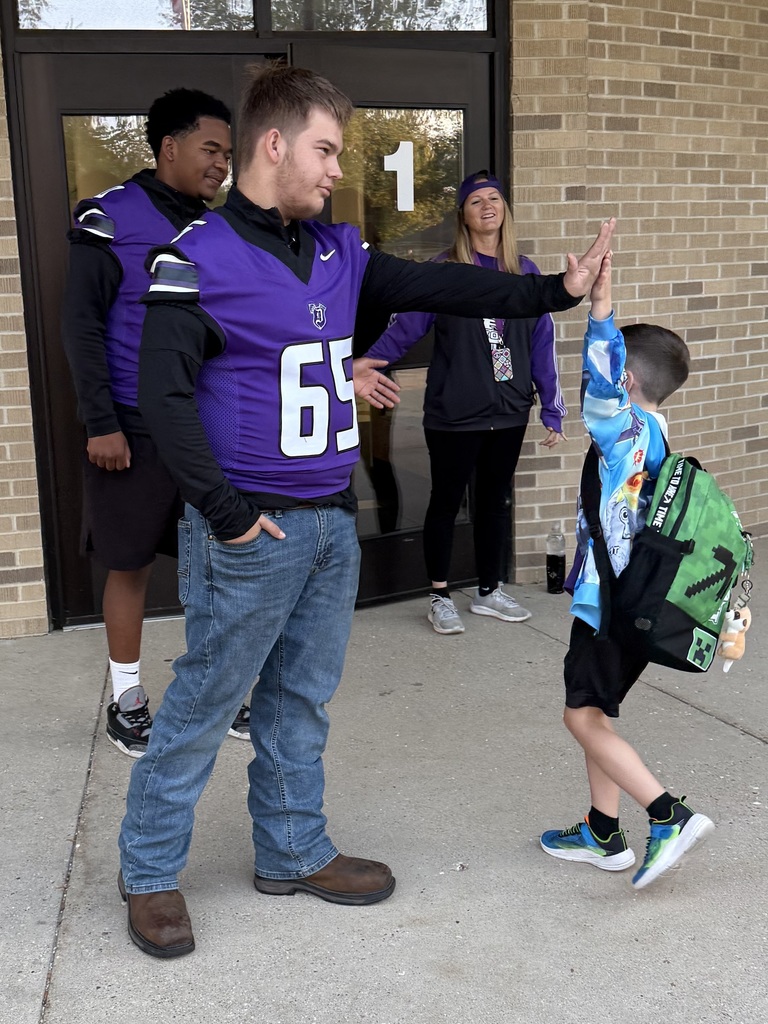 Our Dukes high five our elementary students on their way into the building this morning 