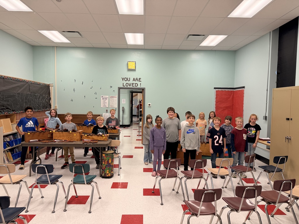 3rd grade students in music class preparing for the Veteran's Day concert