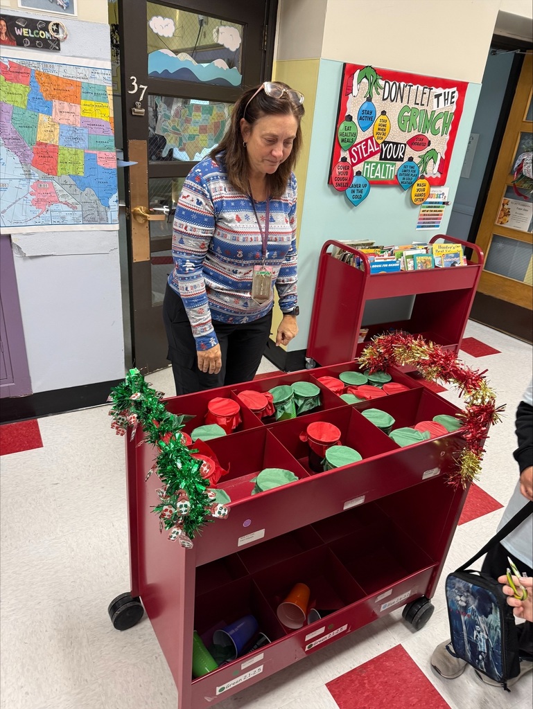 Mrs. Buikema playing our cash or candy game