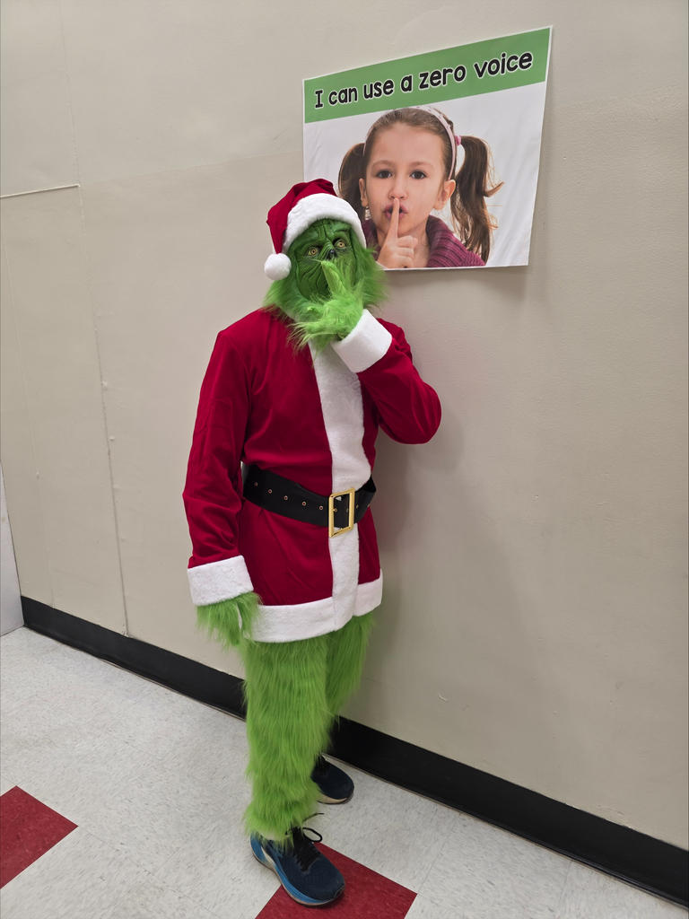 The grinch teasing at one of the posters