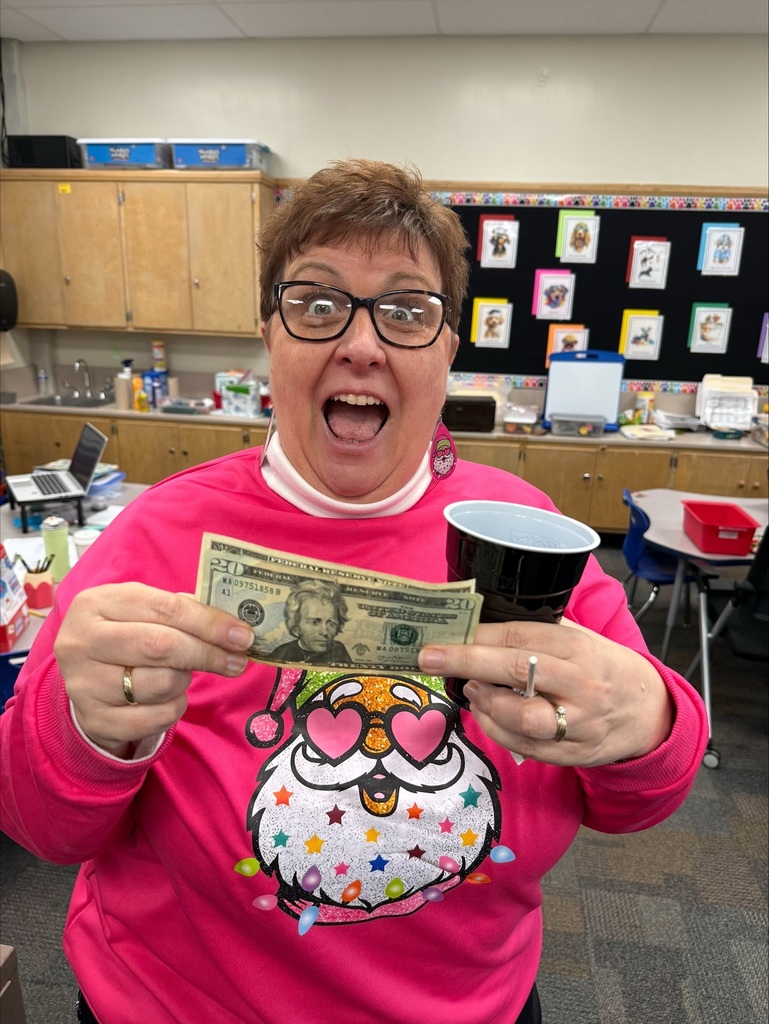 Mrs. Scott with her game winnings 