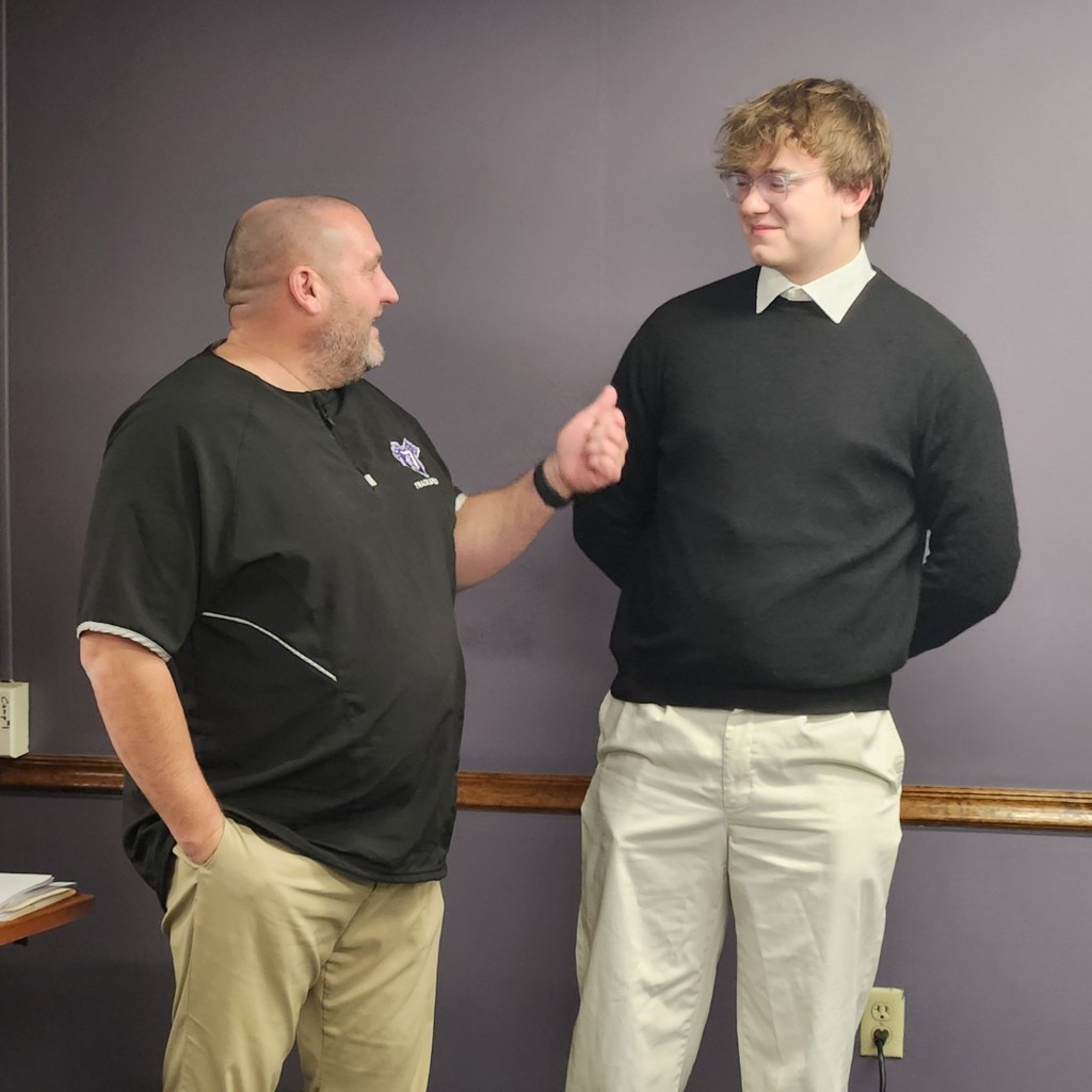 Principal Shaner introduces the DHS, December, Students of the Month, James Coca-Cola at the monthly Board of Education Meeting #gopurple #bepurple