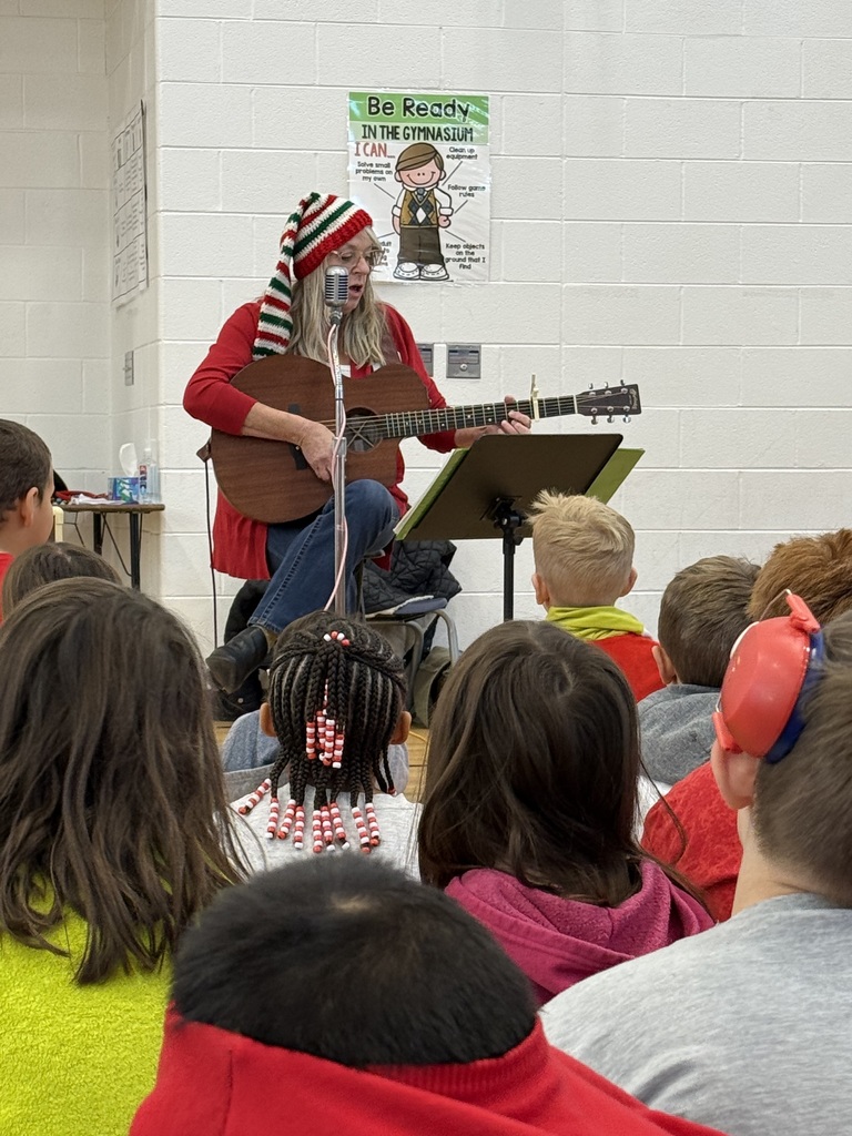 Kathy singing Christmas carols