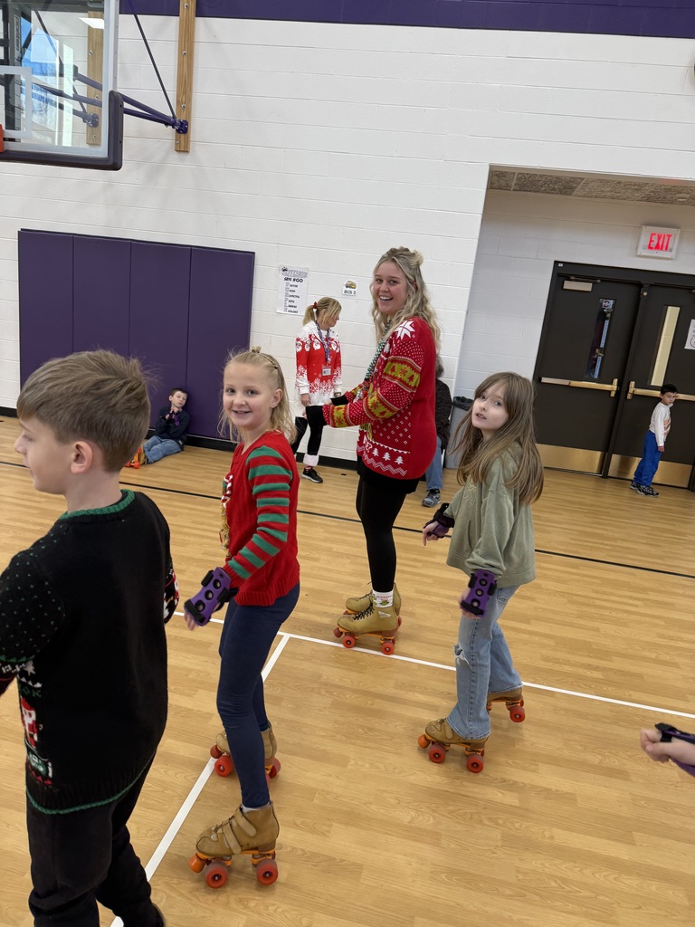 Ms. Point skating with students 