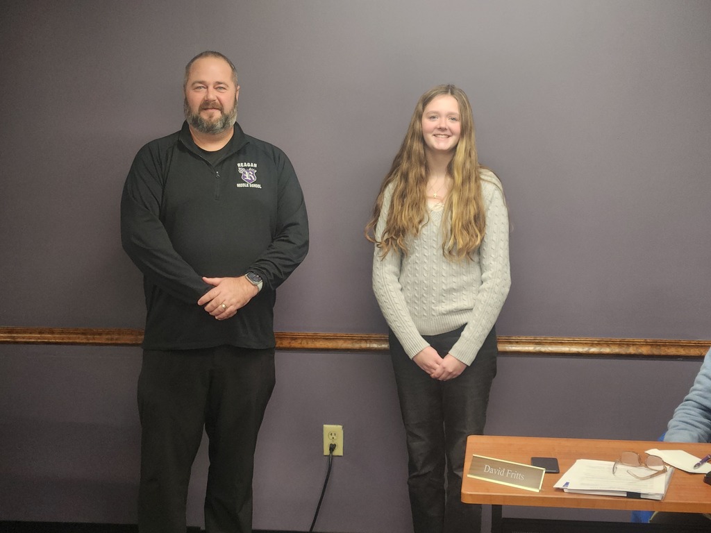 Photo of principal Magnafici and one of our January 26 RMS students of the month