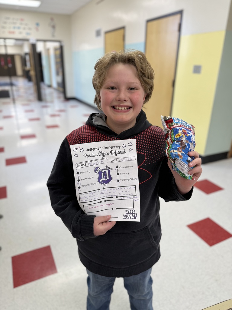 3rd grade students with positive office referral certificates and prizes 