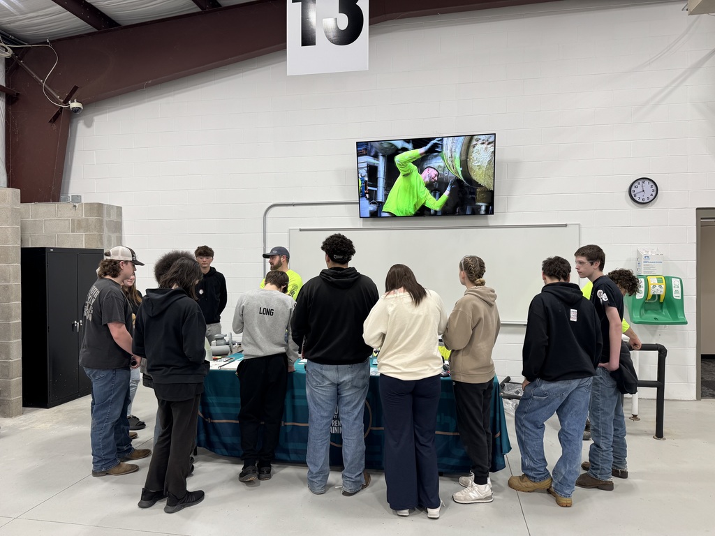 students at trade show