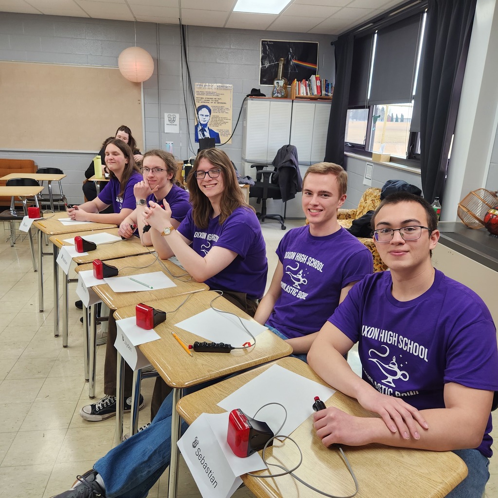 scholastic bowl team holding buzzers