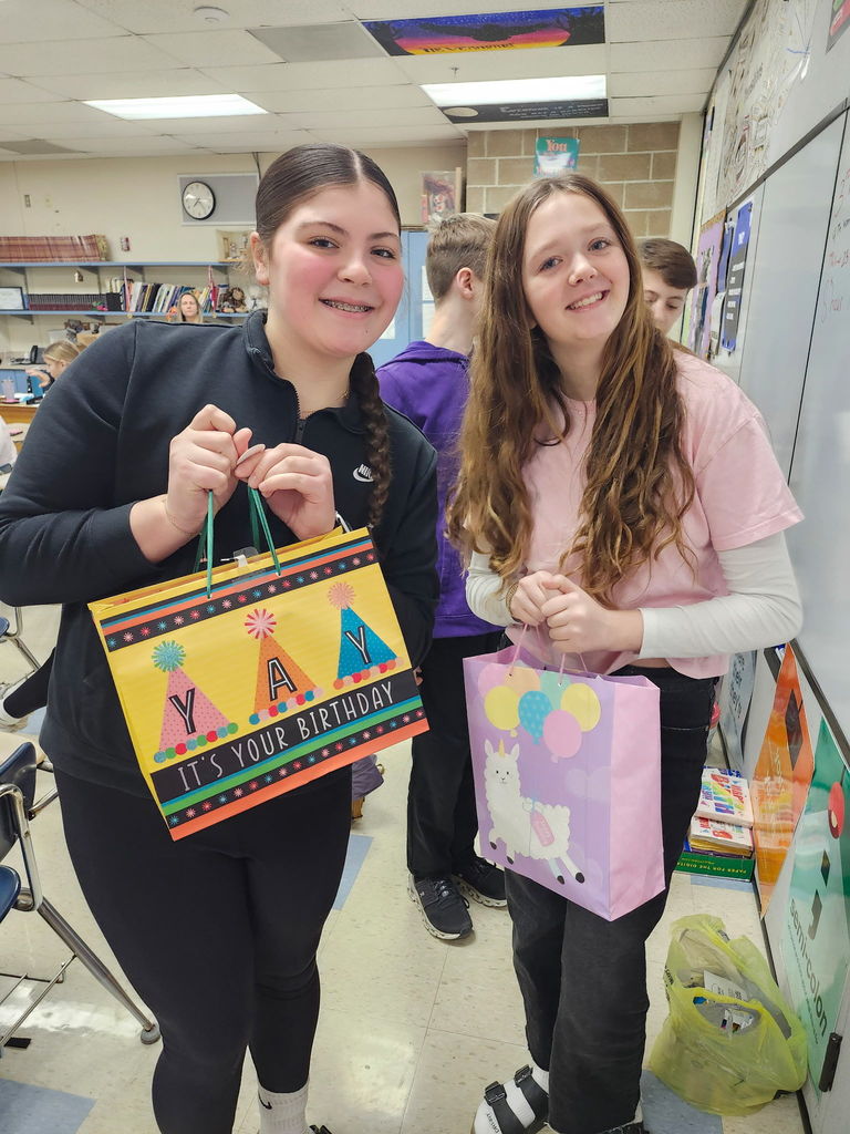 rms builders club with students holding bags