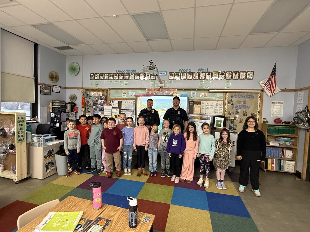 Two DPD officers with Mrs. Conderman's class