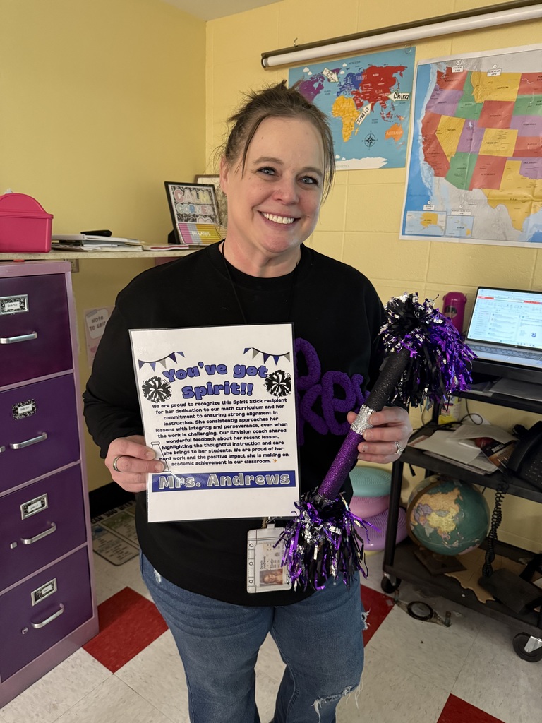Mrs. Andrews with her spirit stick and certificate!