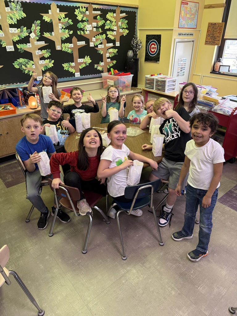 3rd graders enjoying popcorn