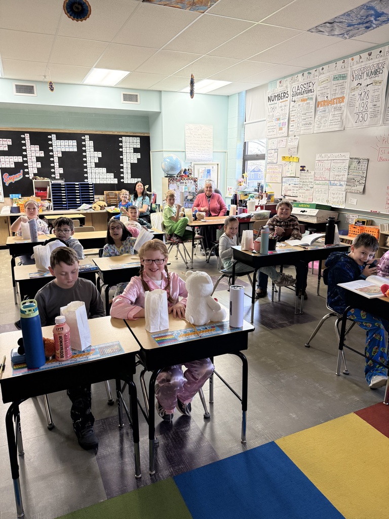 3rd graders enjoying popcorn