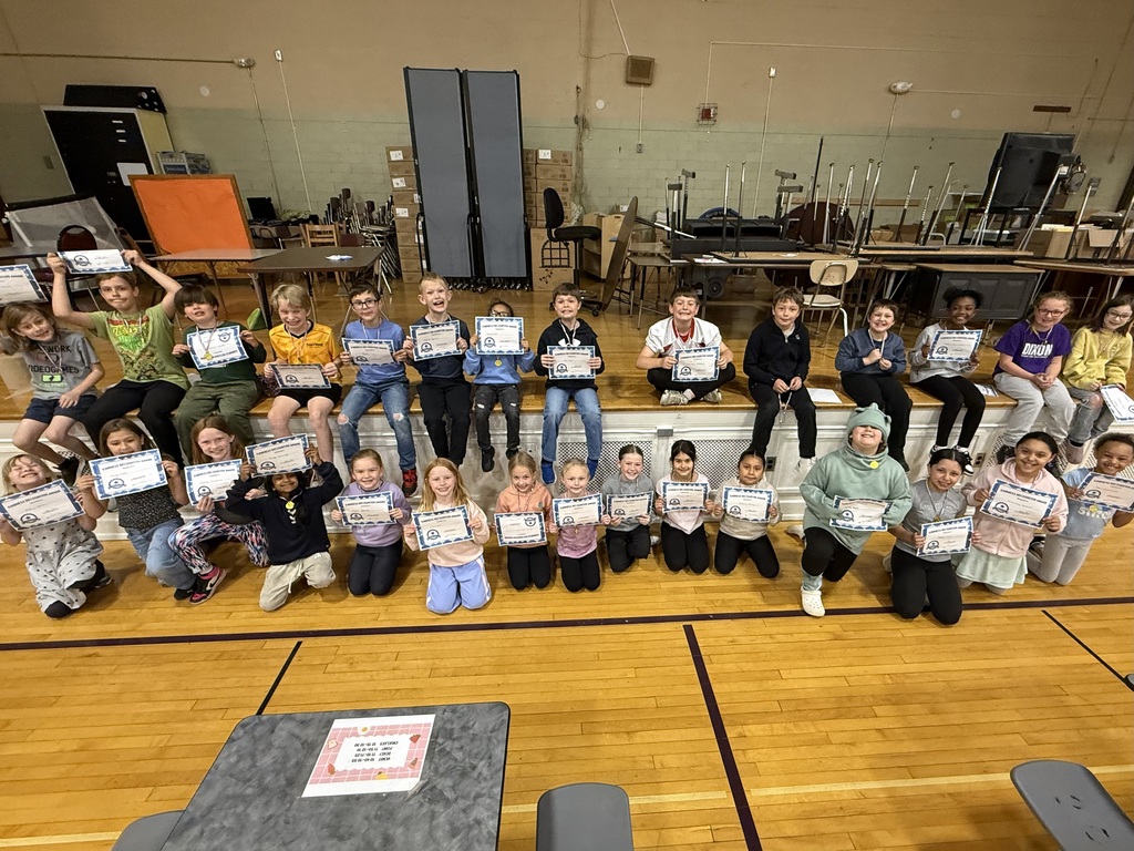 school kindness students with their certificates 