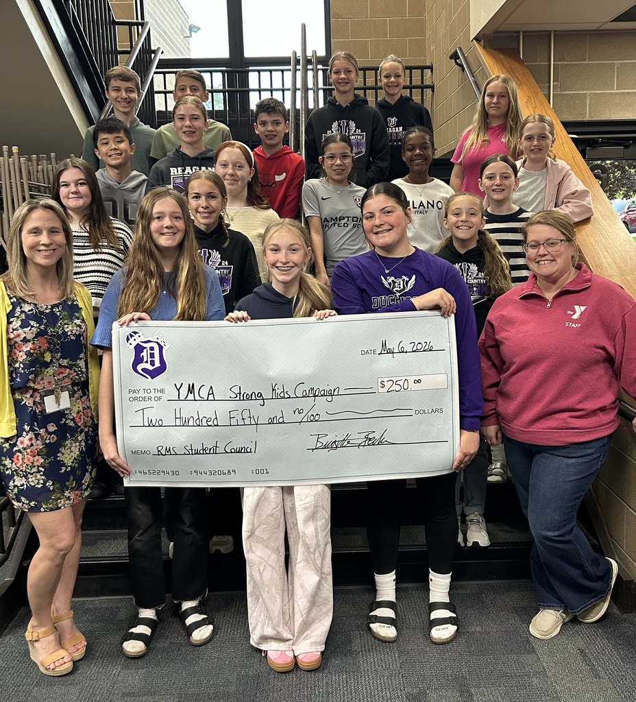 rms builders holding check from YMCA
