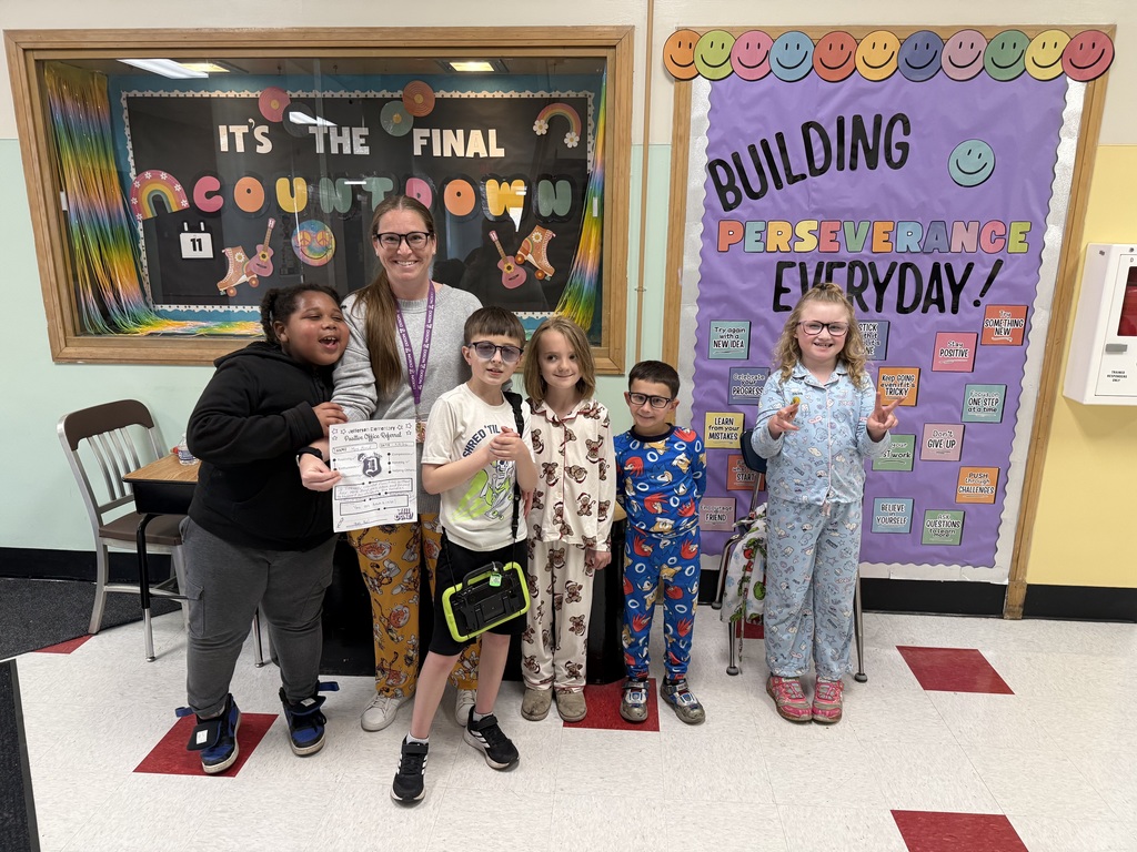 kids with positive office referalls and Mrs. Bond with her positive office referral