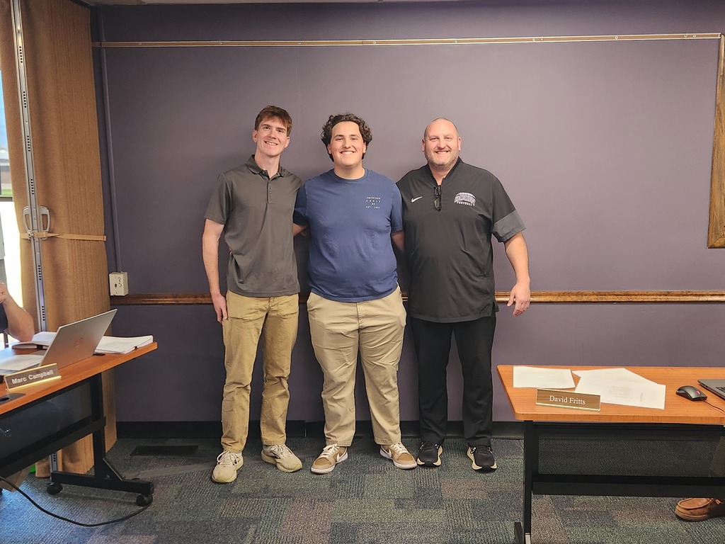 Photo of Principal Shaner with the most recent Students of the Month for Dixon High School