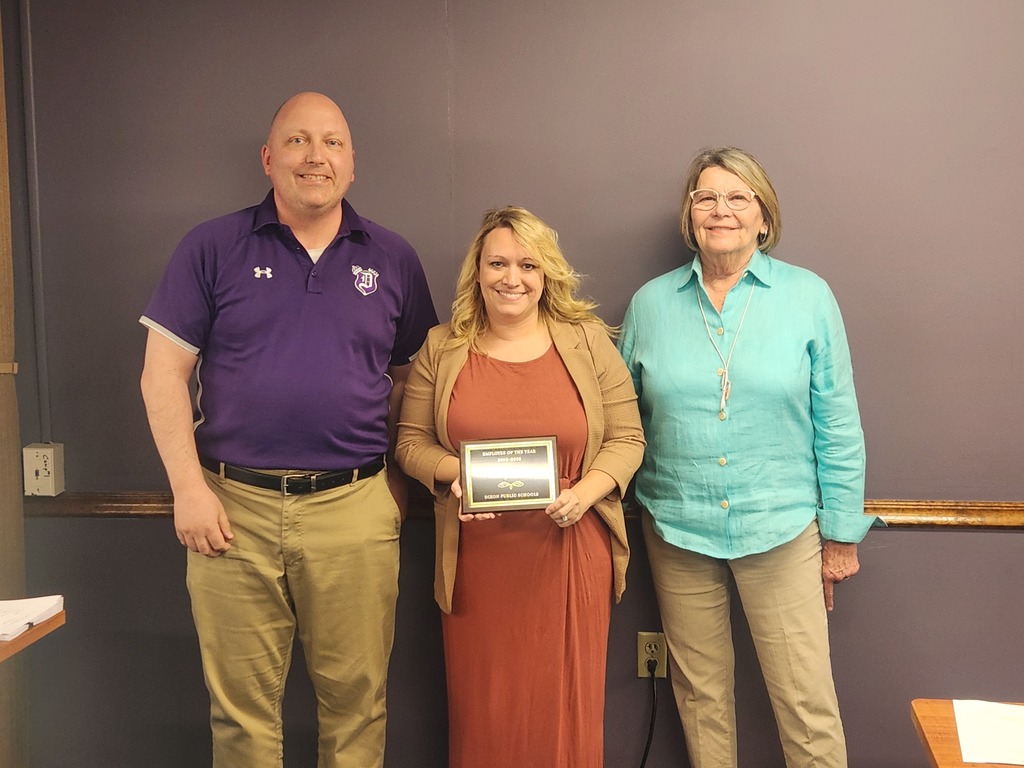 Photo of principal, board president and certified employee of the year